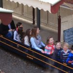 Happy children on miniature train